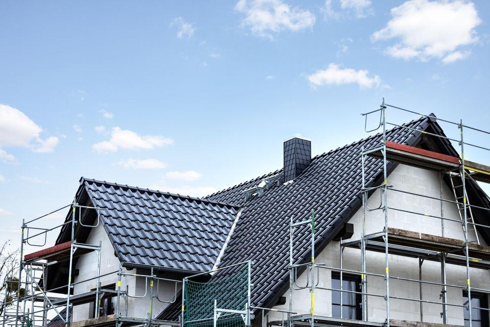 Roof installation with scaffolding