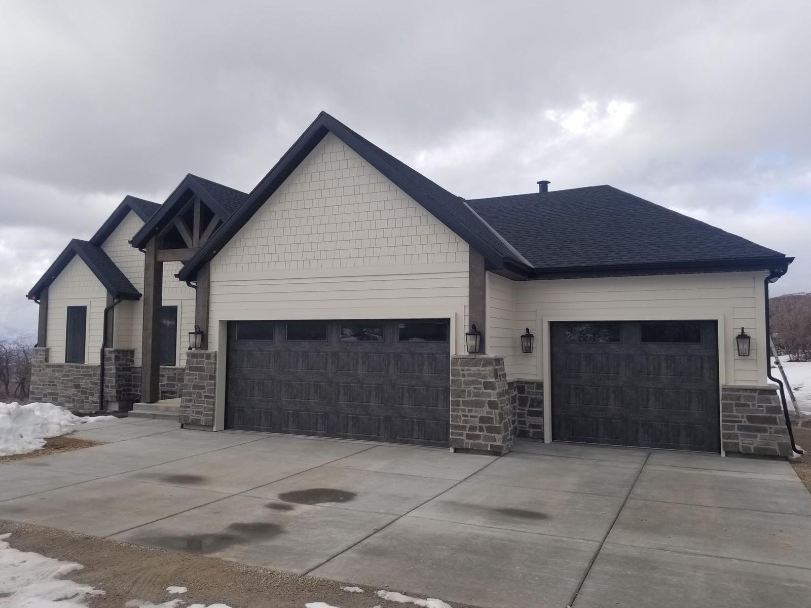 New home with siding and roof in the Salt Lake Valley